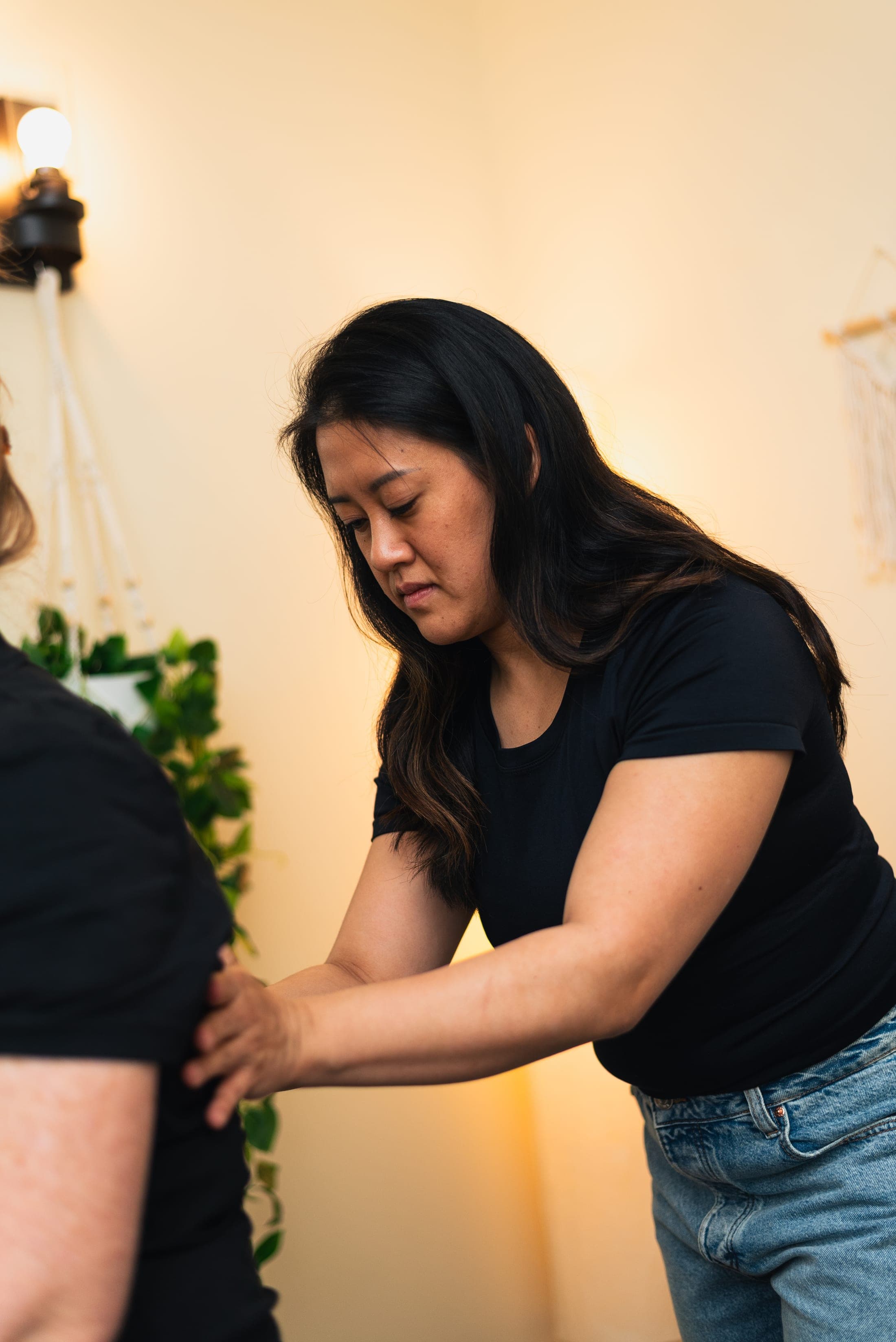An Elysis practitioner assessing a client during treatment